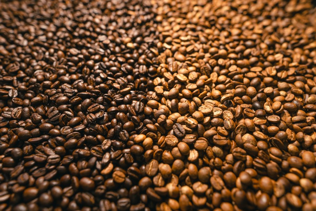 Background of roasted fresh brown Dark and light coffee beans