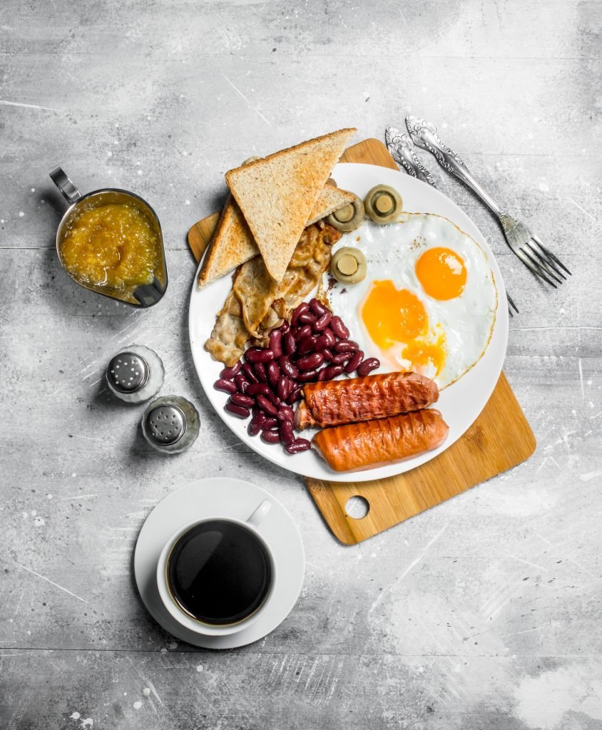 English breakfast. A variety of snacks with aromatic coffee .