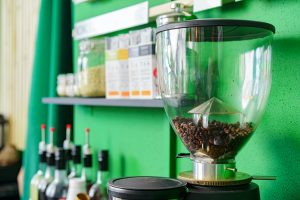 Professional coffee grinder machine in coffee shop