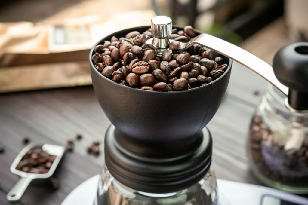 Coffee beans roasted in a manual coffee grinder